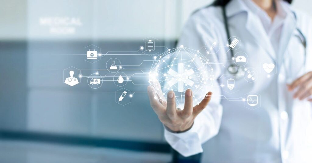 Doctor holding holographic digital healthcare icons