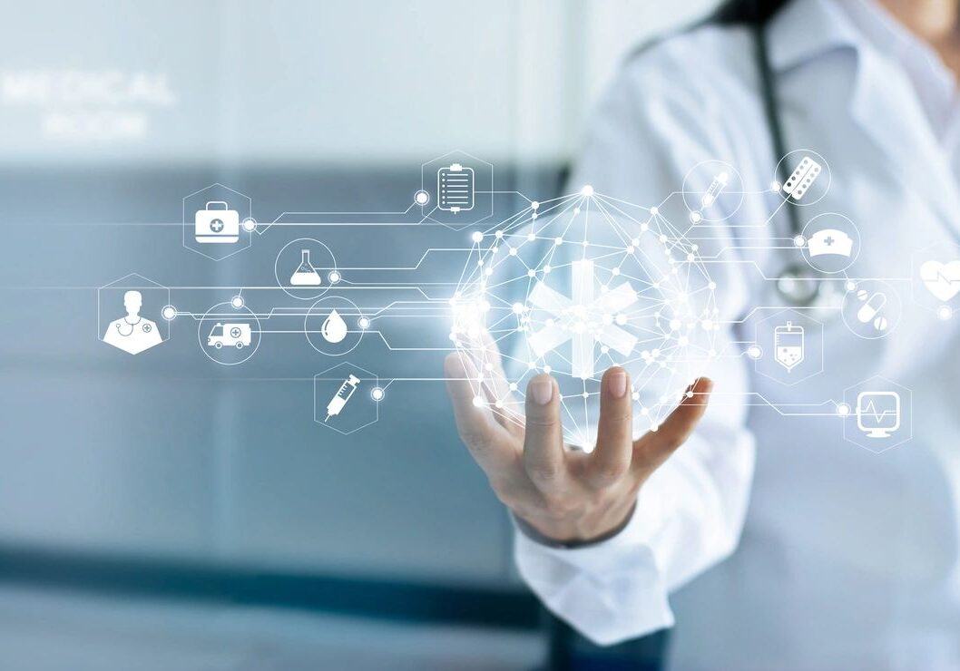 Doctor holding holographic digital healthcare icons